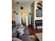 Comfortable living room with a flatscreen TV, modern furniture, and natural light at 2929 E Main St # 601, Mesa, AZ 85213