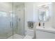 Modern bathroom with a glass-enclosed shower, sleek vanity, and contemporary fixtures at 314 E Royal Palm Rd, Phoenix, AZ 85020