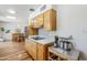 Kitchen with hardwood floors, modern appliances, and ample counter space at 314 E Royal Palm Rd, Phoenix, AZ 85020