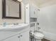 Bathroom with vanity, toilet, mirror, and shower/tub combo at 343 W Santa Cruz Dr, Tempe, AZ 85282