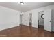 Large bedroom with wood floors, baseboards, and white paint at 343 W Santa Cruz Dr, Tempe, AZ 85282
