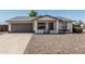 Charming single-story home features a well-maintained front yard, gray garage door, and inviting entrance at 343 W Santa Cruz Dr, Tempe, AZ 85282