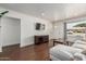 Cozy living room with hardwood floors, large window, and comfortable gray sectional at 343 W Santa Cruz Dr, Tempe, AZ 85282