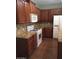 Spacious kitchen featuring wood cabinets, stone countertops and stainless steel appliances at 3636 E Parkview Dr, Gilbert, AZ 85295