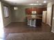 Open kitchen with a central island, tile flooring, and stainless steel appliances at 3636 E Parkview Dr, Gilbert, AZ 85295