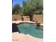 Backyard swimming pool featuring a built-in grill and decorative water feature at 3636 E Parkview Dr, Gilbert, AZ 85295