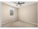 The bedroom offers a blank canvas with its carpeted floors and neutral walls, ready for your personal touch and style at 3948 E Caitlin Dr, San Tan Valley, AZ 85140