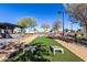 Community park featuring cornhole, covered barbecue and picnic area with benches at 3948 E Caitlin Dr, San Tan Valley, AZ 85140