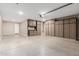 This well-lit garage offers ample space with built-in cabinetry, blending functionality with storage solutions at 3948 E Caitlin Dr, San Tan Valley, AZ 85140