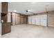Spacious garage is enhanced with custom built-in storage cabinets, providing an organized area for vehicles and storage at 3948 E Caitlin Dr, San Tan Valley, AZ 85140