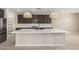 Bright, modern kitchen with a large island, stainless steel appliances, and pendant lighting at 3948 E Caitlin Dr, San Tan Valley, AZ 85140