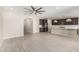 Open-concept layout seamlessly connects the living room to the kitchen area, perfect for modern living at 3948 E Caitlin Dr, San Tan Valley, AZ 85140