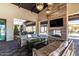 Inviting community lounge area with gas fireplace, comfortable couches and TV for relaxing with friends and Gathering at 3948 E Caitlin Dr, San Tan Valley, AZ 85140