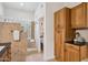 Elegant primary bathroom with a walk-in shower featuring glass blocks and extra storage cabinets at 4146 N Lomond --, Mesa, AZ 85215