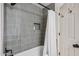 Bathroom with a bathtub and shower with tiled walls, including a built-in soap niche at 4146 N Lomond --, Mesa, AZ 85215