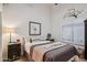 Bedroom features a bed with modern-style bedside tables, decorations, and artwork at 4146 N Lomond --, Mesa, AZ 85215