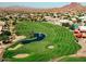 Scenic aerial view of a lush golf course with a water feature, set against a backdrop of mountains and desert landscape at 4146 N Lomond --, Mesa, AZ 85215