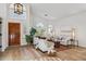 Bright living room with cathedral ceiling, wood floors, plantation shutters, and lots of natural light at 4146 N Lomond --, Mesa, AZ 85215