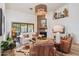 Comfortable Living room with a fireplace, wood floors, and rustic decor elements at 4146 N Lomond --, Mesa, AZ 85215