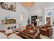 Warm Gathering Room with wood-style flooring, desert decor, and TV at 4146 N Lomond --, Mesa, AZ 85215
