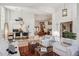 Open floor plan showcases seamless flow between the living and dining areas with lovely white walls at 4146 N Lomond --, Mesa, AZ 85215