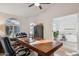 Bright home office with large wood desk, comfortable executive chair, and lots of natural light at 4146 N Lomond --, Mesa, AZ 85215