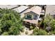 An overhead view of a charming two-story home with landscaped yard and desert landscaping at 4379 E Rosemonte Dr, Phoenix, AZ 85050