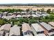 An aerial view of many residential homes with mountains in the background on a clear, sunny day at 4379 E Rosemonte Dr, Phoenix, AZ 85050