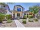 Charming two-story home featuring a landscaped yard with desert landscaping for easy maintenance and appealing curb appeal at 4379 E Rosemonte Dr, Phoenix, AZ 85050