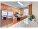 Bright and functional kitchen with granite countertops, stainless steel appliances, and ample storage for all your needs at 4379 E Rosemonte Dr, Phoenix, AZ 85050