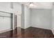 Bedroom featuring wood floors, ceiling fan and closet space at 4601 N 102Nd Ave # 1178, Phoenix, AZ 85037