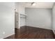 Bedroom features ceiling fan, hardwood floors, closet and neutral paint at 4601 N 102Nd Ave # 1178, Phoenix, AZ 85037