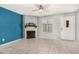 Comfortable living room featuring a tile floor, a fireplace, and ample space at 4601 N 102Nd Ave # 1178, Phoenix, AZ 85037