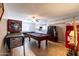 Fun game room featuring a pool table, pinball machine, and classic arcade games for entertainment at 5751 W Muriel Dr, Glendale, AZ 85308