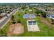 Aerial view of park featuring tennis courts, playgrounds, and green space at 5751 W Muriel Dr, Glendale, AZ 85308