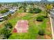 Aerial view of park featuring basketball court, trees, and green space at 5751 W Muriel Dr, Glendale, AZ 85308