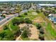 Aerial view of park featuring basketball court, playground, and green space at 5751 W Muriel Dr, Glendale, AZ 85308