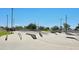 Skate park featuring ramps, rails, and concrete bowls for skating enthusiasts at 5751 W Muriel Dr, Glendale, AZ 85308