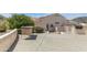 The property features a covered outdoor kitchen area and a built-in BBQ for entertaining guests outside at 5949 W Pinnacle Hill Dr, Glendale, AZ 85310