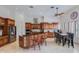 Gourmet kitchen featuring custom cabinetry, granite countertops, and stainless steel appliances at 5949 W Pinnacle Hill Dr, Glendale, AZ 85310