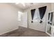 Inviting bedroom with a ceiling fan and neutral tones, offering a blank canvas for personalization at 6033 W Wood St, Phoenix, AZ 85043