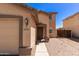 A charming home with a well-maintained front yard and a welcoming entrance at 6033 W Wood St, Phoenix, AZ 85043