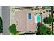 An aerial perspective of a home showcasing a solar panel roof and a private backyard pool oasis at 6135 E Campo Bello Dr, Scottsdale, AZ 85254
