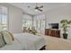 Spacious main bedroom with carpet, windows with plantation shutters and ceiling fan at 6135 E Campo Bello Dr, Scottsdale, AZ 85254