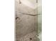 Modern shower with glass door, neutral tile, and sleek fixtures for a spa-like experience at 6135 E Campo Bello Dr, Scottsdale, AZ 85254