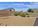 Spacious backyard with desert landscaping, block wall privacy, and mountain views at 6602 W Lariat Ln, Phoenix, AZ 85083