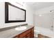 Bright bathroom with a large mirror and vanity with a sink at 6602 W Lariat Ln, Phoenix, AZ 85083