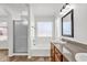 Bathroom featuring a shower, tub, and single sink vanity at 6602 W Lariat Ln, Phoenix, AZ 85083