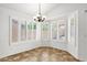 Bright dining nook featuring plantation shutters offering views to the backyard at 6602 W Lariat Ln, Phoenix, AZ 85083