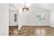 Bright foyer featuring tile floors, white walls, and natural light from windows at 6602 W Lariat Ln, Phoenix, AZ 85083